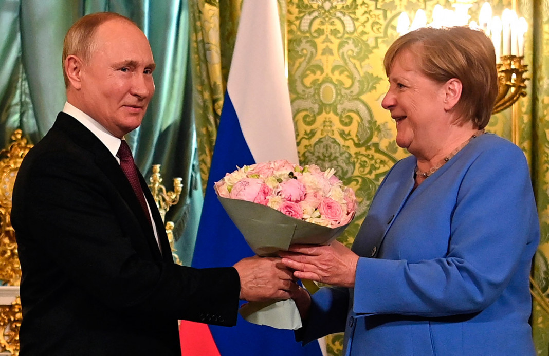 Angela Merkel junto a Vladimir Putin