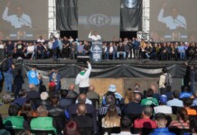 Con sugestivas ausencias en el escenario, la CGT pidió una reducción de la jornada laboral Acto de la CGT el día del trabajador - Foto: NA